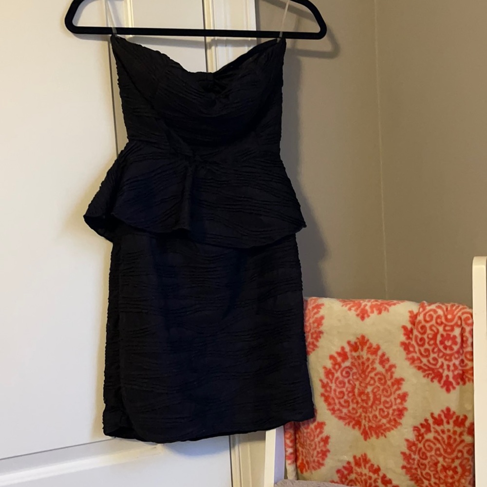 Strapless open back peplum cocktail dress